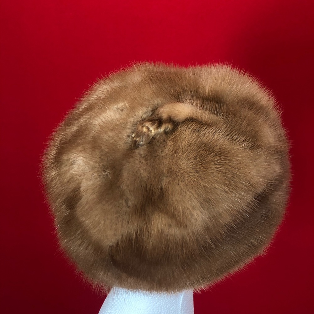 Fur hat with paw